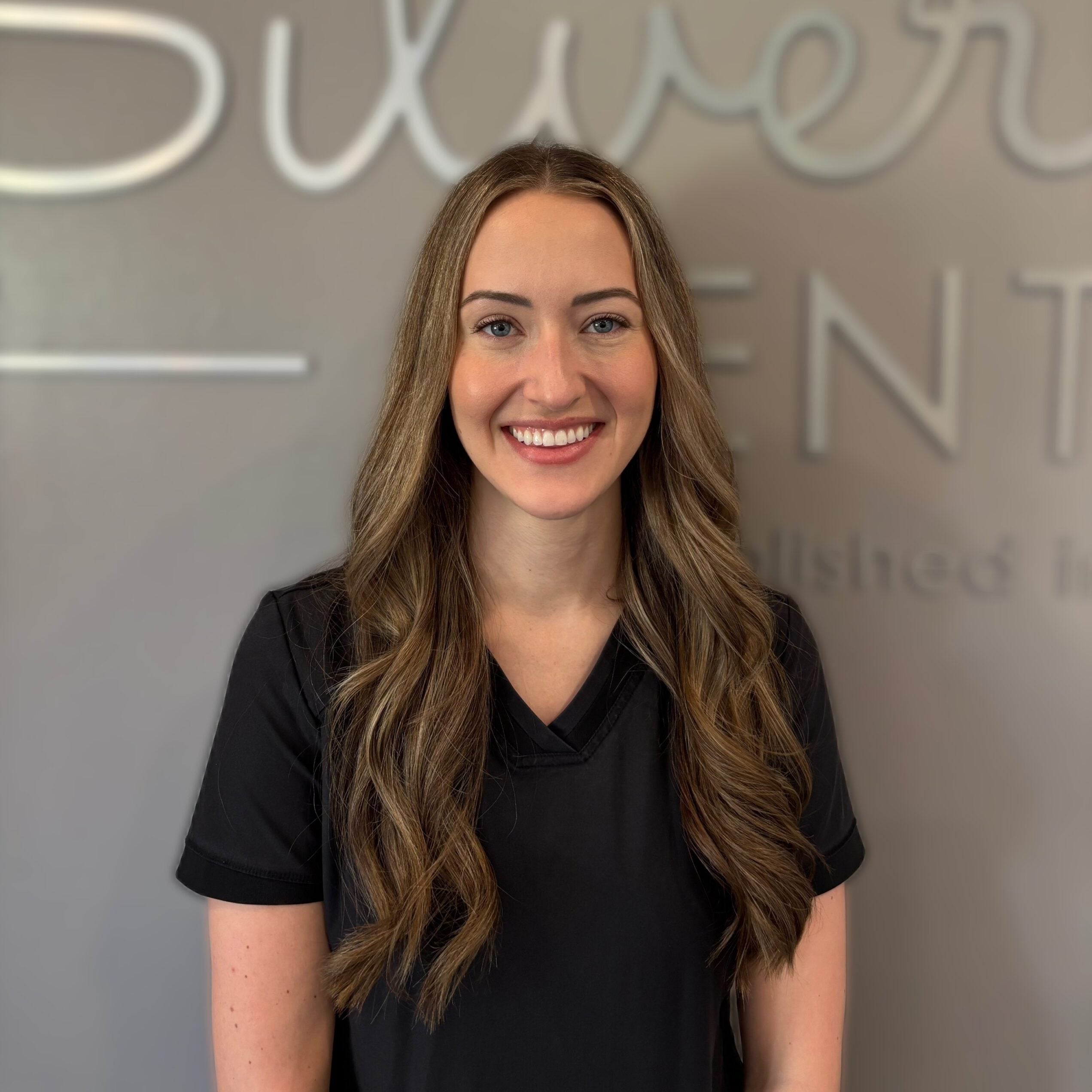 Headshot of Dr. Caitlin Martinson